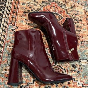 Burgundy high-heeled boots